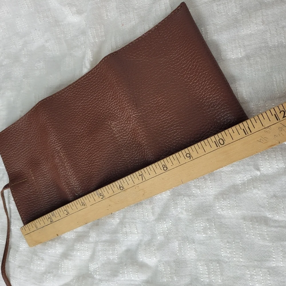 Mark & Graham brown pebbled leather charger rollup pockets tie closure minimal
